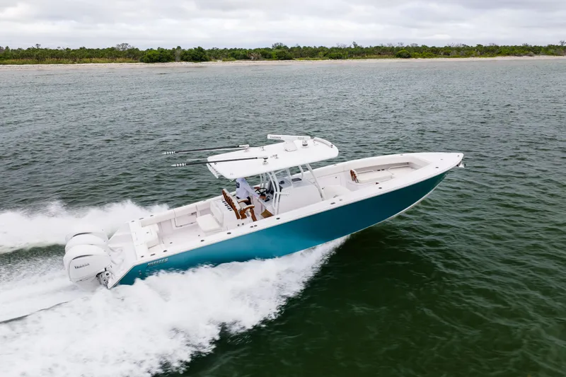  Yacht Photos Pics 2022 Jupiter 38 HFS boat cruising on open water, showcasing sleek design and powerful engines.