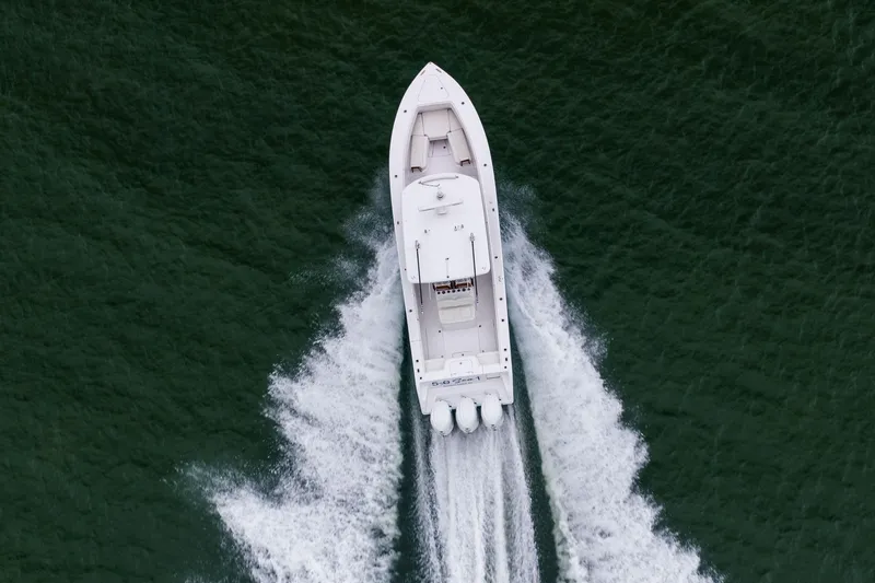  Yacht Photos Pics Aerial view of 2022 Jupiter 38 HFS boat cruising on open water.