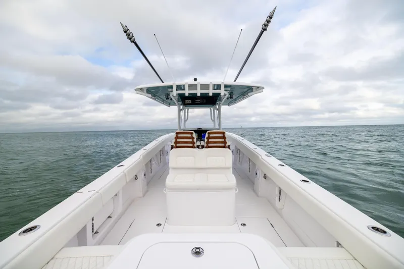  Yacht Photos Pics 2022 Jupiter 38 HFS boat on open water under cloudy sky.