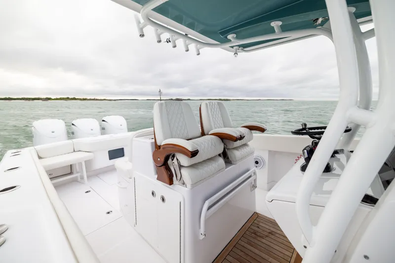  Yacht Photos Pics 2022 Jupiter 38 HFS boat interior with luxurious seating and ocean view.
