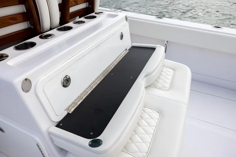  Yacht Photos Pics Luxury seating on 2022 Jupiter 38 HFS boat with cup holders and quilted cushions.