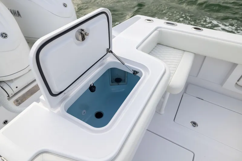  Yacht Photos Pics 2022 Jupiter 38 HFS boat with open livewell and cushioned seating.