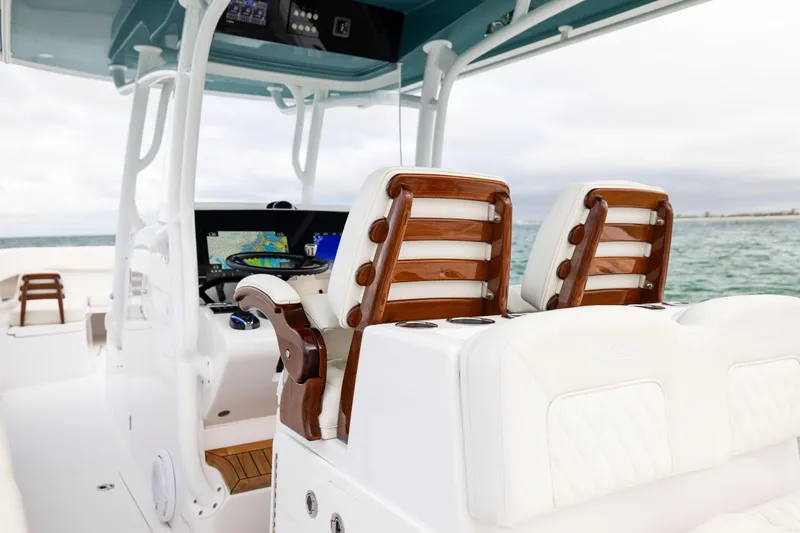  Yacht Photos Pics 2022 Jupiter 38 HFS boat interior with luxurious seating and advanced navigation system.