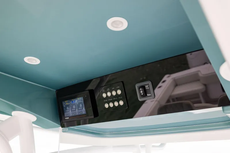  Yacht Photos Pics 2022 Jupiter 38 HFS boat dashboard with digital display and controls.