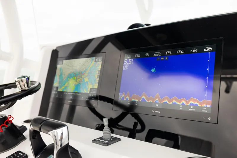  Yacht Photos Pics Control panel of 2022 Jupiter 38 HFS boat with Garmin navigation displays.