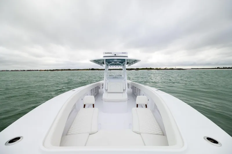 Yacht Photos Pics 2022 Jupiter 38 HFS boat on open water under cloudy skies.