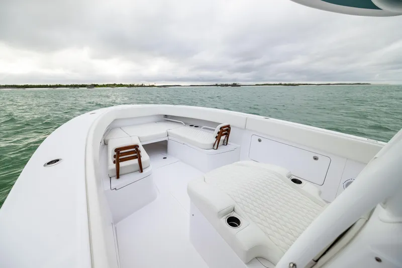  Yacht Photos Pics 2022 Jupiter 38 HFS boat interior with white seating on open water.