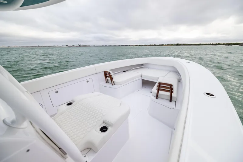  Yacht Photos Pics 2022 Jupiter 38 HFS boat interior with white seating on open water.