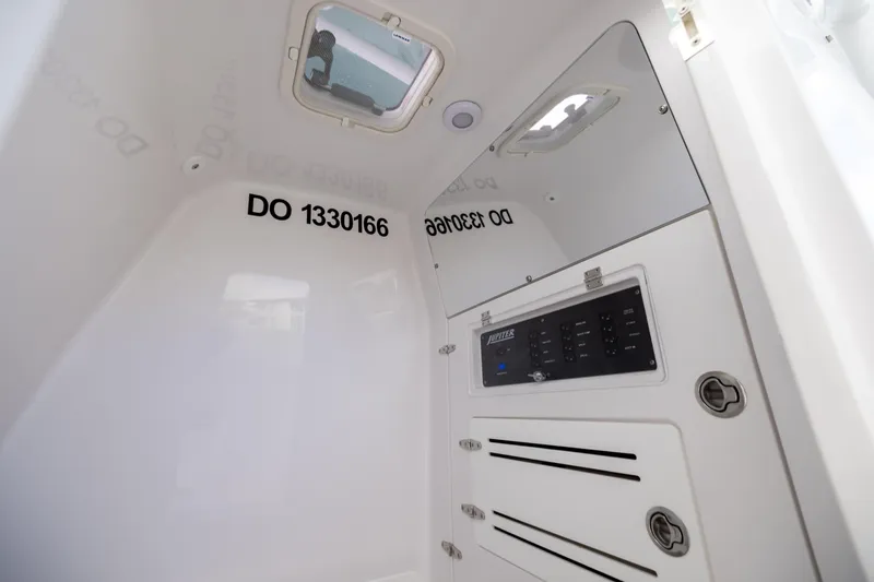  Yacht Photos Pics Interior of 2022 Jupiter 38 HFS boat with control panel and hatch.