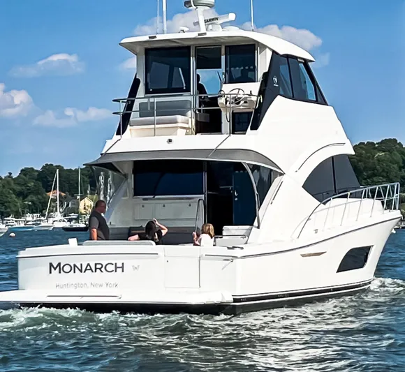  Yacht Photos Pics 2023 Riviera 57 Enclosed Flybridge yacht cruising in Huntington, New York waters.