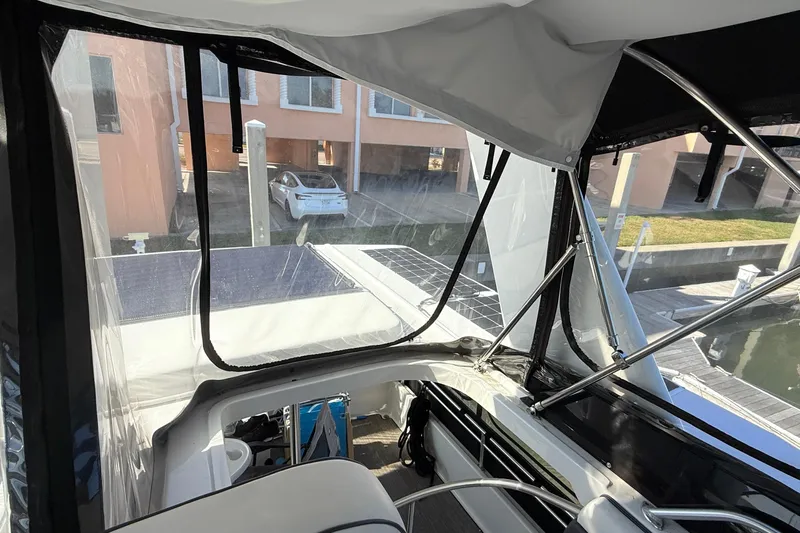 Cole-lateral Damage Yacht Photos Pics Interior view of 1998 Mainship 47 Motor Yacht with marina backdrop.