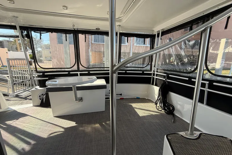 Cole-lateral Damage Yacht Photos Pics 1998 Mainship 47 Motor Yacht interior with spacious seating and panoramic windows.