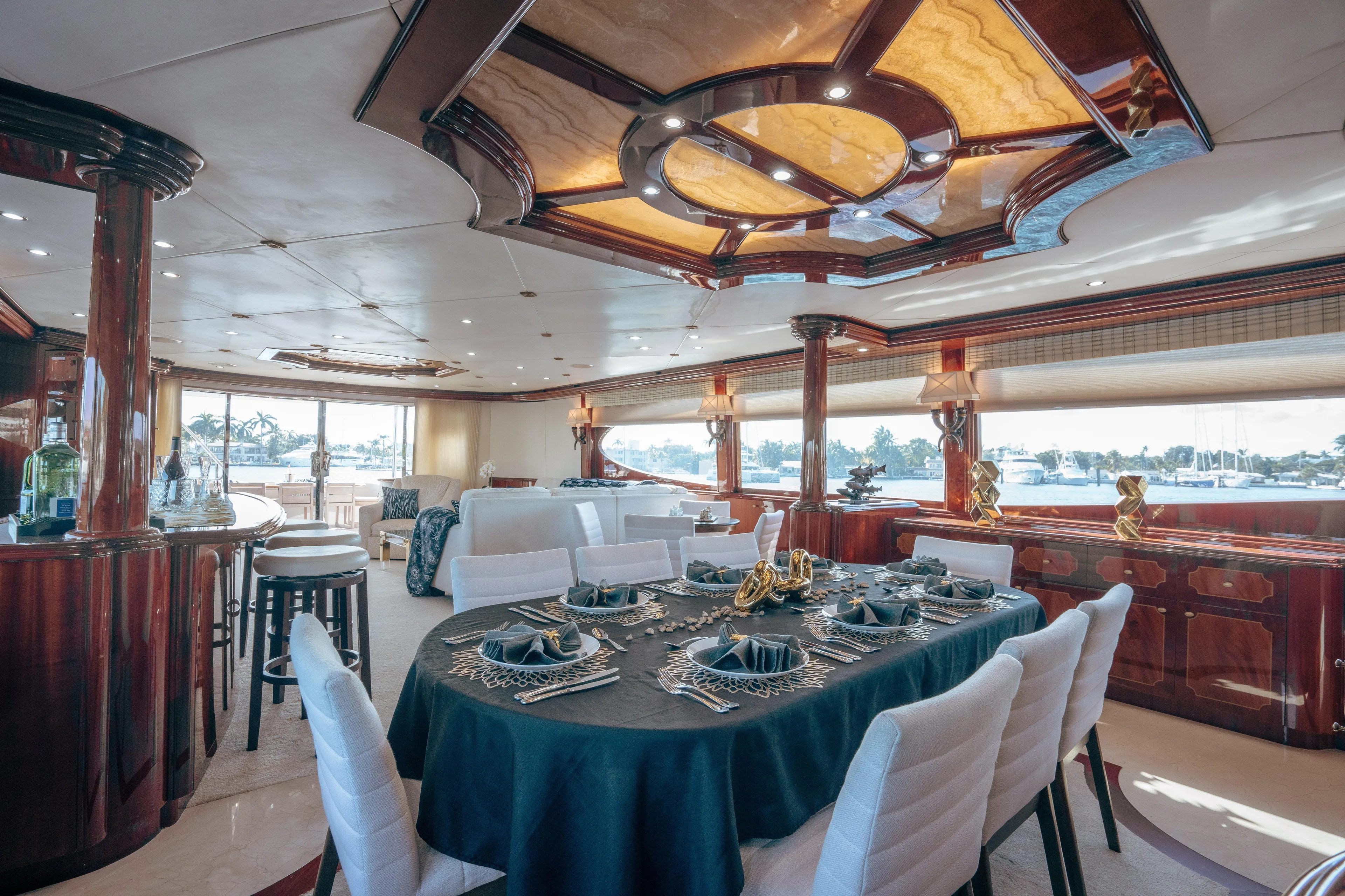 Lady Kristina Yacht Photos Pics Luxurious 2004 Lazzara LY106 yacht interior with elegant dining area and panoramic windows.