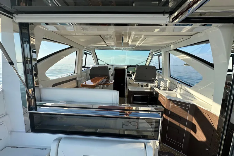  Yacht Photos Pics Luxurious interior of 2024 Pursuit OS 445 Offshore yacht with modern design and ocean view.