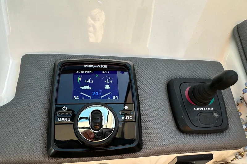  Yacht Photos Pics 2024 Pursuit OS 445 Offshore control panel with Zipwake and Lewmar systems.
