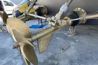 Propeller system of a 2004 Mangusta 80 Open yacht, showcasing detailed engineering.