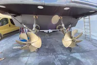 Propellers of a 2004 Mangusta 80 Open yacht on dry dock.