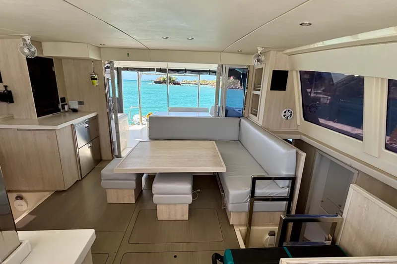  Yacht Photos Pics Luxurious interior of 2016 Leopard 40 catamaran with ocean view and modern furnishings.