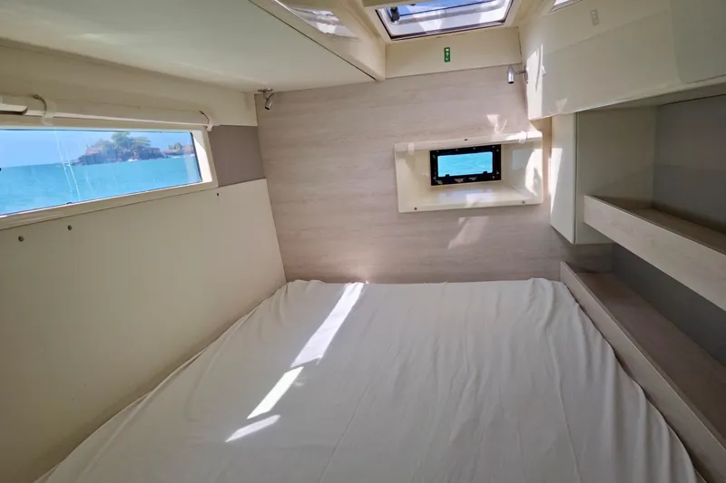  Yacht Photos Pics Cabin interior of 2016 Leopard 40 catamaran with ocean view through windows.