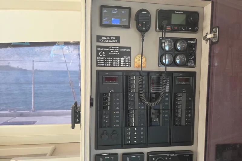  Yacht Photos Pics Electrical control panel on a 2016 Leopard 40 catamaran, featuring various switches and gauges.