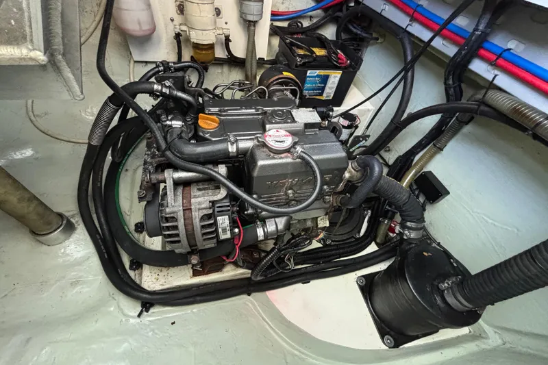  Yacht Photos Pics Engine compartment of a 2016 Leopard 40 catamaran, featuring wiring and battery setup.