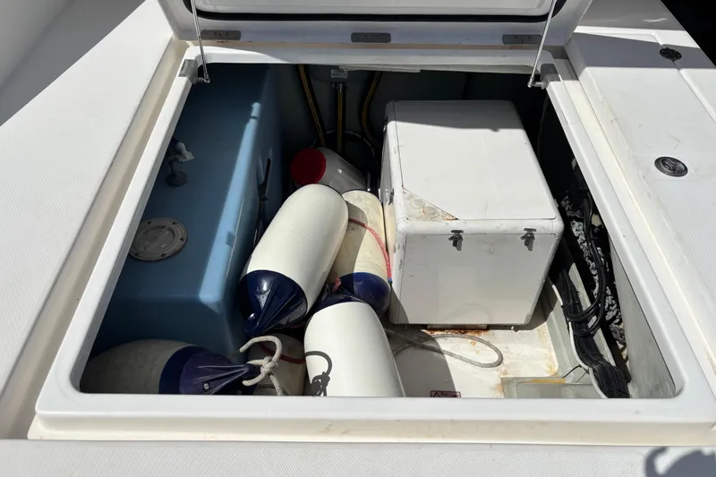  Yacht Photos Pics Storage compartment of a 2016 Leopard 40 boat with fenders and equipment.