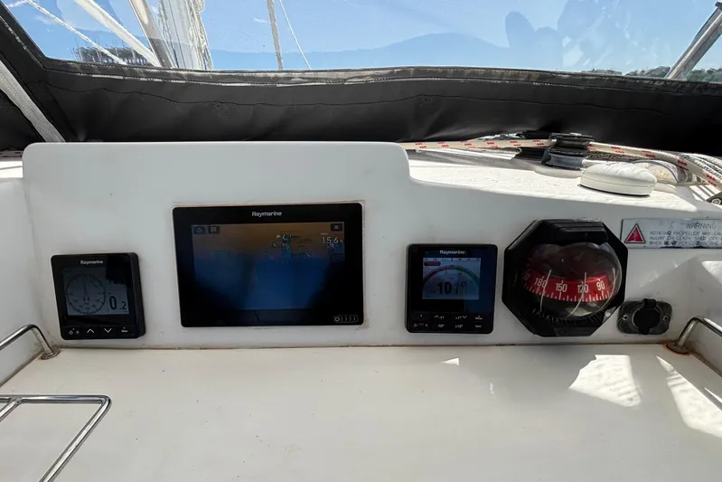  Yacht Photos Pics Cockpit of 2016 Leopard 40 catamaran with Raymarine navigation instruments and compass.