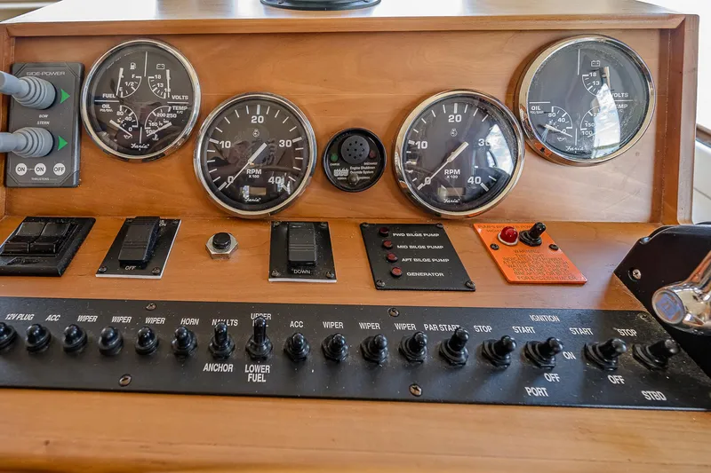 Coastal Fogg Yacht Photos Pics Control panel of a 2006 Mainship 34 Trawler with gauges and switches.