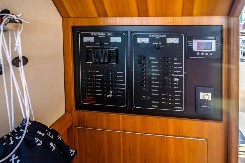 Coastal Fogg Yacht Photos Pics Electrical control panel on a 2006 Mainship 34 Trawler boat interior.