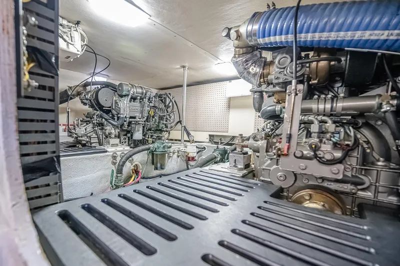 Coastal Fogg Yacht Photos Pics Engine room of 2006 Mainship 34 Trawler, showcasing detailed mechanical components.