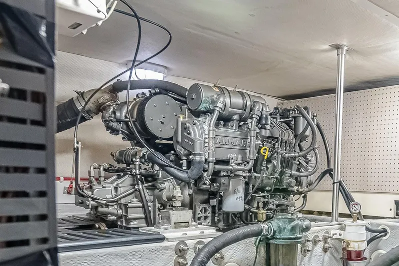 Coastal Fogg Yacht Photos Pics Engine room of a 2006 Mainship 34 Trawler, featuring a Yanmar engine.