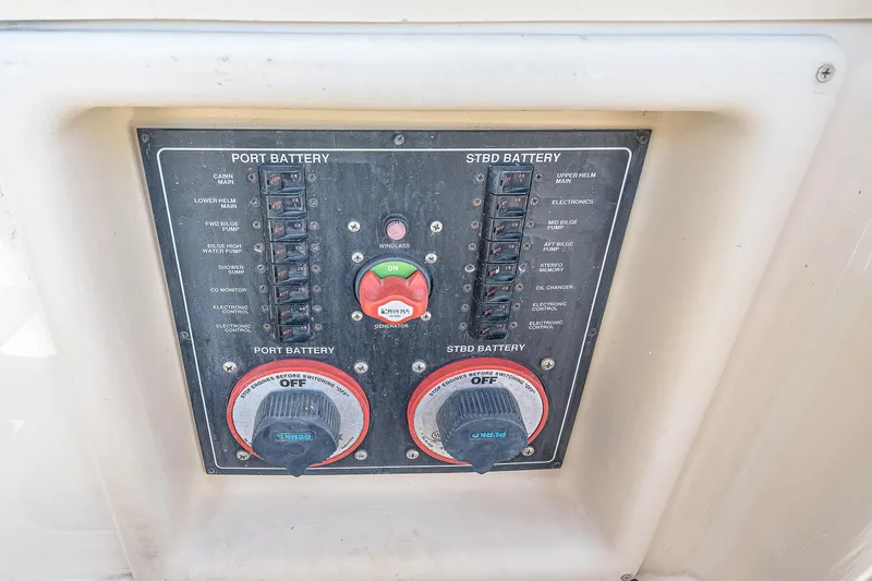 Coastal Fogg Yacht Photos Pics Control panel of a 2006 Mainship 34 Trawler, featuring port and starboard battery switches.