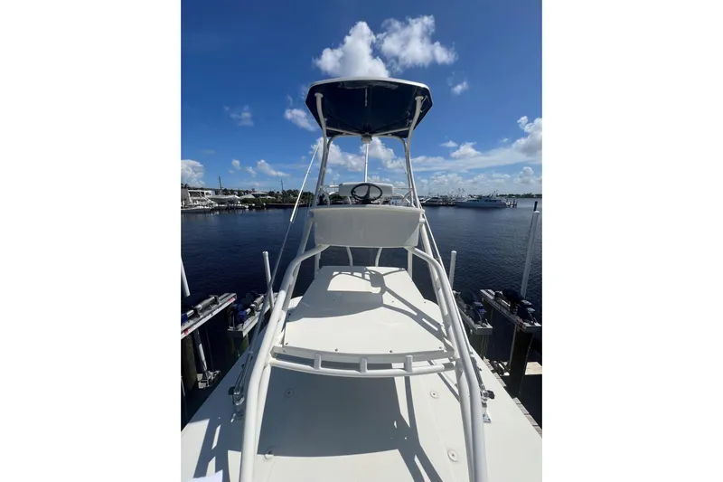 Five Wahoos Yacht Photos Pics 2015 HCB 42 Siesta boat docked under clear blue sky.