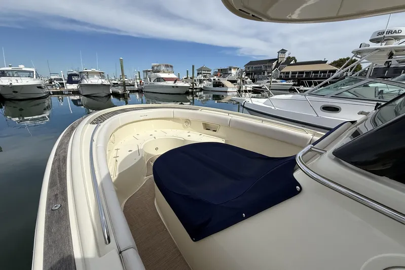 Yacht Photos Pics 2019 Chris-Craft Catalina 30 docked at marina, surrounded by other boats.
