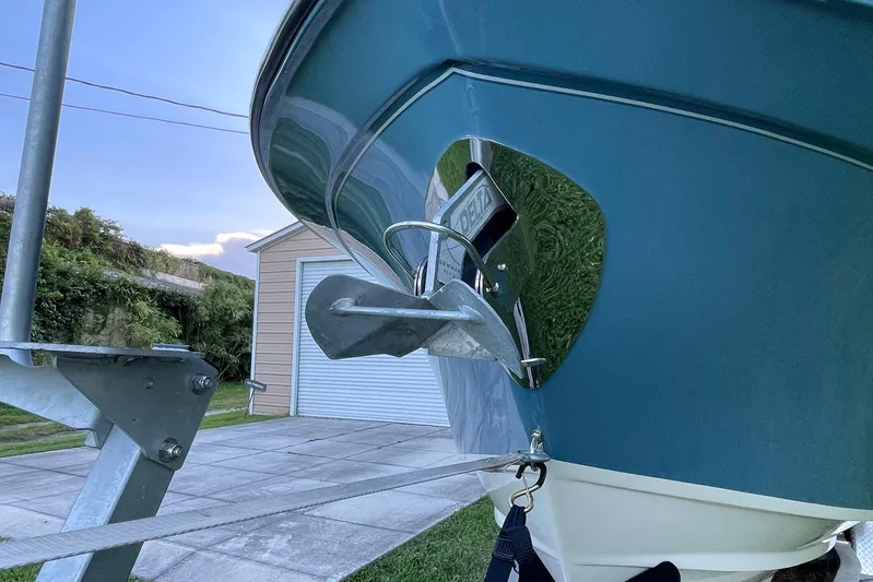  Yacht Photos Pics 2021 Grady-White Freedom 275 boat anchored on trailer, close-up view.