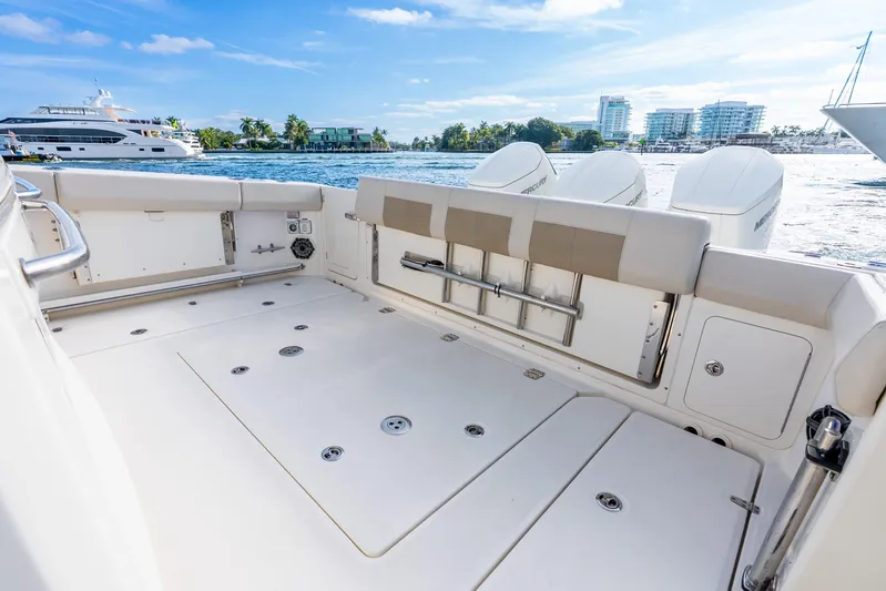 Gugui Yacht Photos Pics 2024 Boston Whaler 420 Outrage boat deck with seating and ocean view.