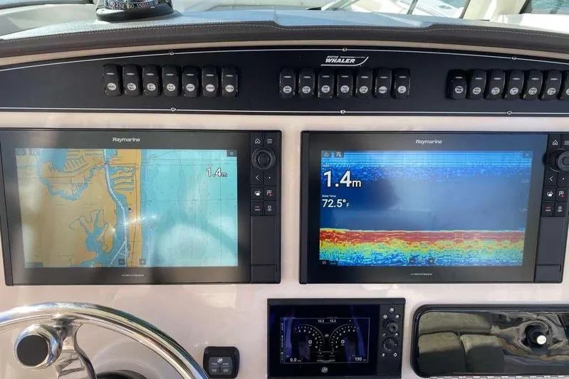 Yacht Photos Pics Dashboard of 2019 Boston Whaler 330 Outrage with Raymarine navigation displays.
