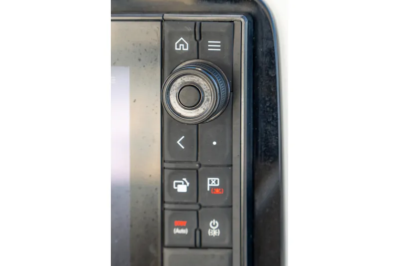 Dakiti Yacht Photos Pics Control panel of 2023 Lagoon 46 yacht with navigation buttons and dial.