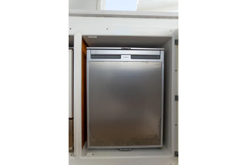 Dakiti Yacht Photos Pics Stainless steel refrigerator in 2023 Lagoon 46 yacht interior.