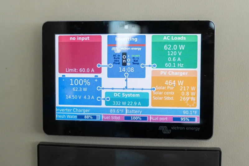 Dakiti Yacht Photos Pics Touchscreen display showing power management on a 2023 Lagoon 46 catamaran.