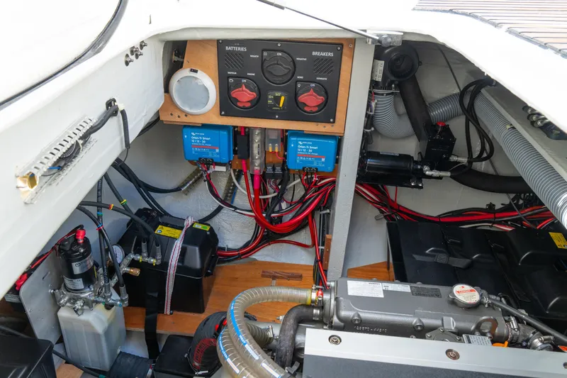 Dakiti Yacht Photos Pics Electrical system of a 2023 Lagoon 46 yacht, featuring batteries and wiring.