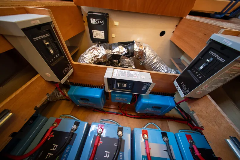 Dakiti Yacht Photos Pics Electrical system of 2023 Lagoon 46 yacht, featuring batteries and circuit breakers.