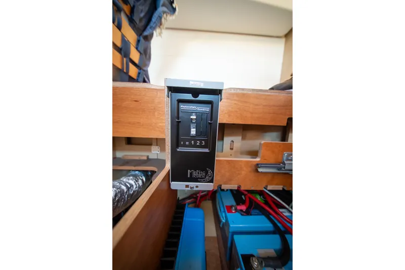 Dakiti Yacht Photos Pics Photovoltaic controller in 2023 Lagoon 46 yacht interior, showcasing electrical components.