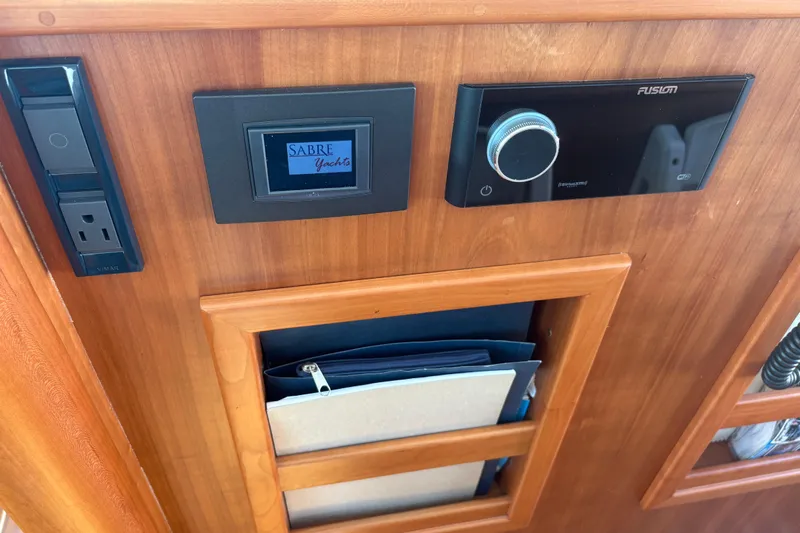  Yacht Photos Pics Control panel of 2023 Sabre 45 Salon Express yacht interior.