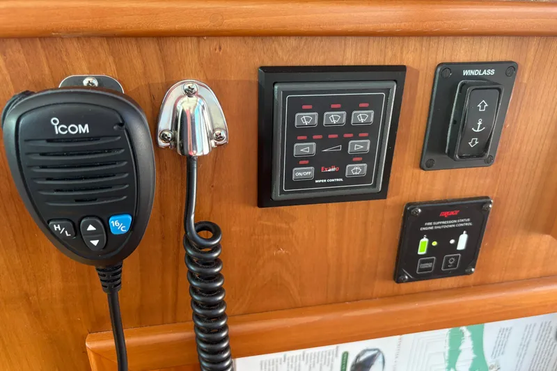  Yacht Photos Pics Control panel of 2023 Sabre 45 Salon Express with Icom radio and windlass switch.