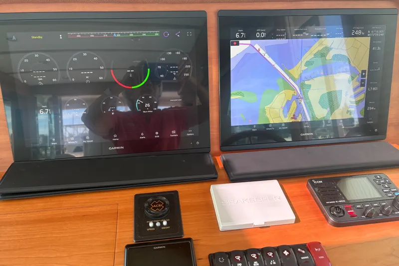 Yacht Photos Pics Dashboard of 2023 Sabre 45 Salon Express with Garmin navigation displays and controls.