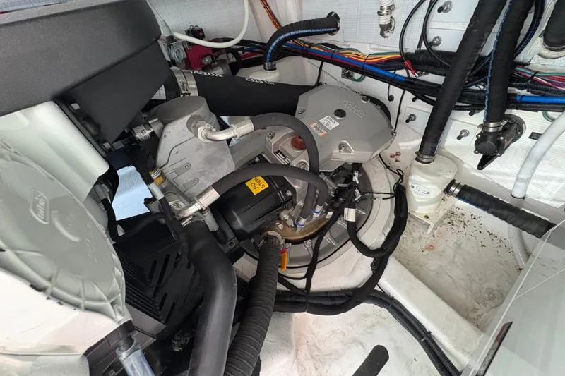  Yacht Photos Pics Engine room of 2023 Sabre 45 Salon Express with visible mechanical components.