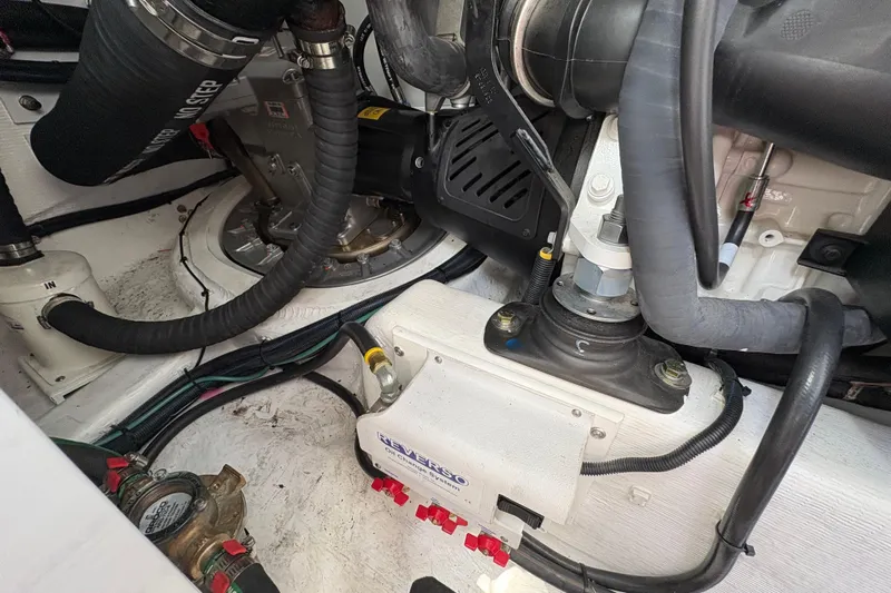  Yacht Photos Pics Engine room of 2023 Sabre 45 Salon Express, showcasing mechanical components and wiring.