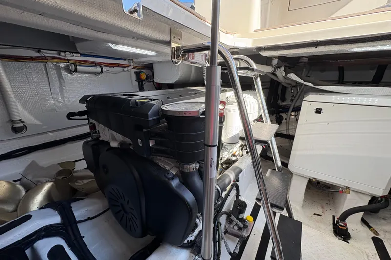  Yacht Photos Pics Engine room of 2023 Sabre 45 Salon Express, showcasing modern marine machinery and equipment.