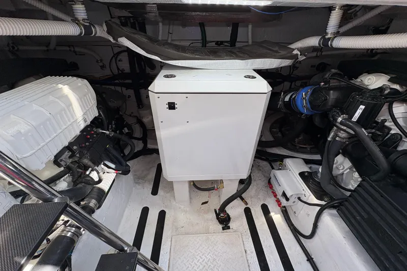  Yacht Photos Pics Engine room of 2023 Sabre 45 Salon Express with visible machinery and components.